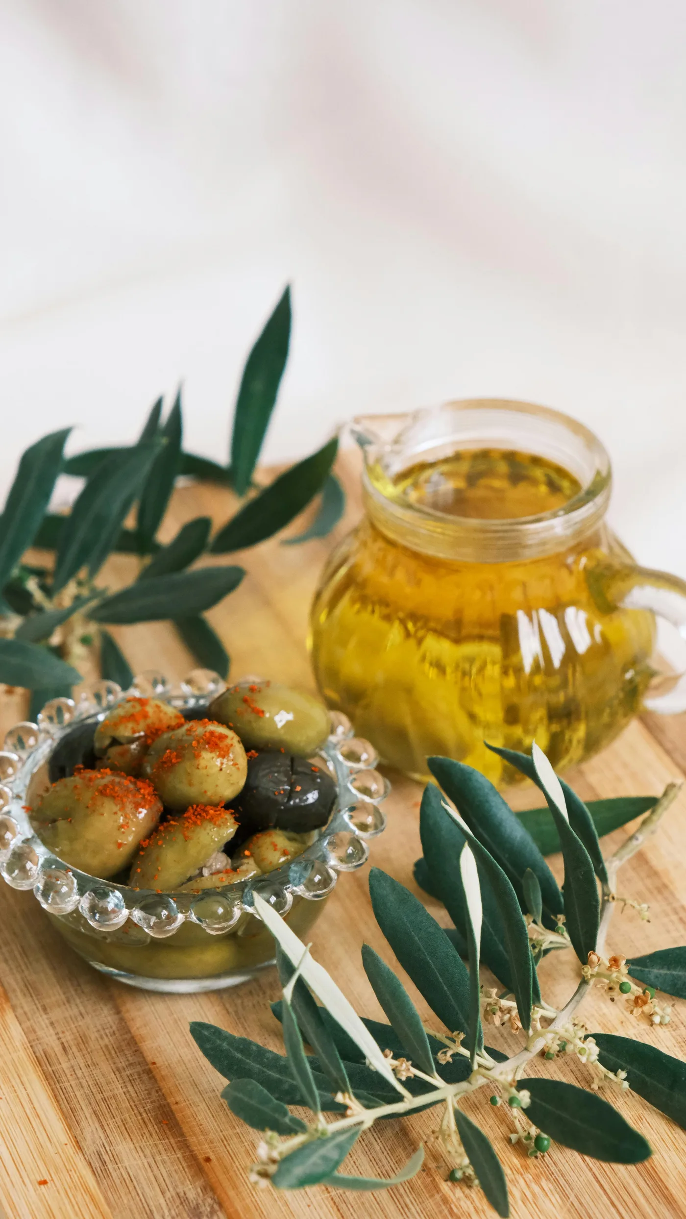 Fresh olives and olive oil